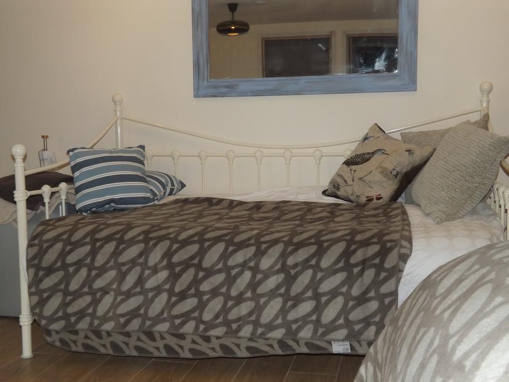 نيو كي The Swallows Guest House الغرفة الصورة